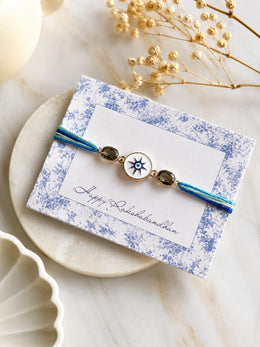 Nazar Charm Rakhi – Blue Evil Eye Thread Rakhi
