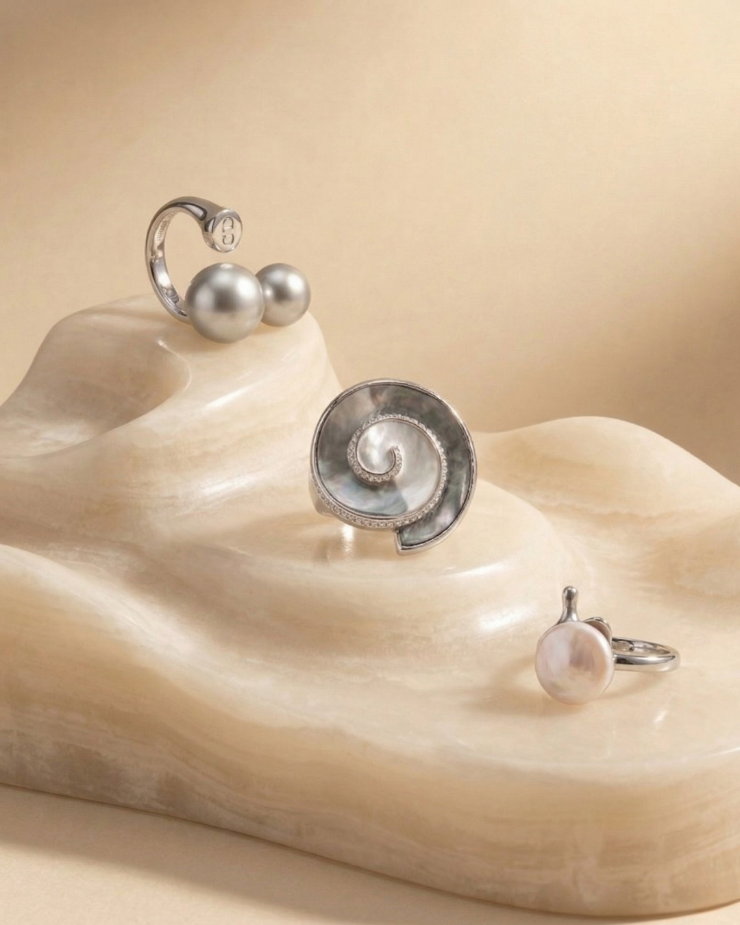 Moon crest spiral ring with orbit duo and pearl ring