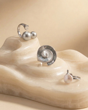 Moon crest spiral ring with orbit duo and pearl ring
