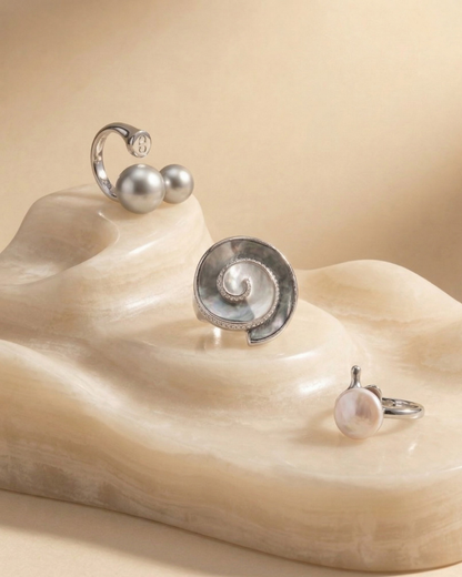Moon crest spiral ring with orbit duo and pearl ring