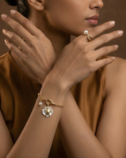 Turtle charm and shine bracelet with aura G pearl ring