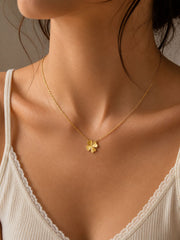 Golden clover charm pendant